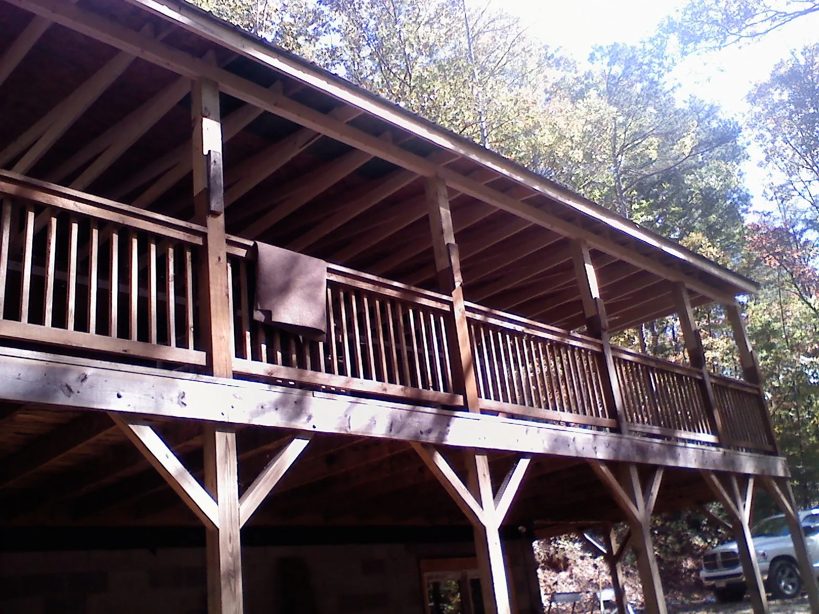 Timber framing under a new elevated porch and deck — Roof Leak Repair in National City by Roofing Brothers
